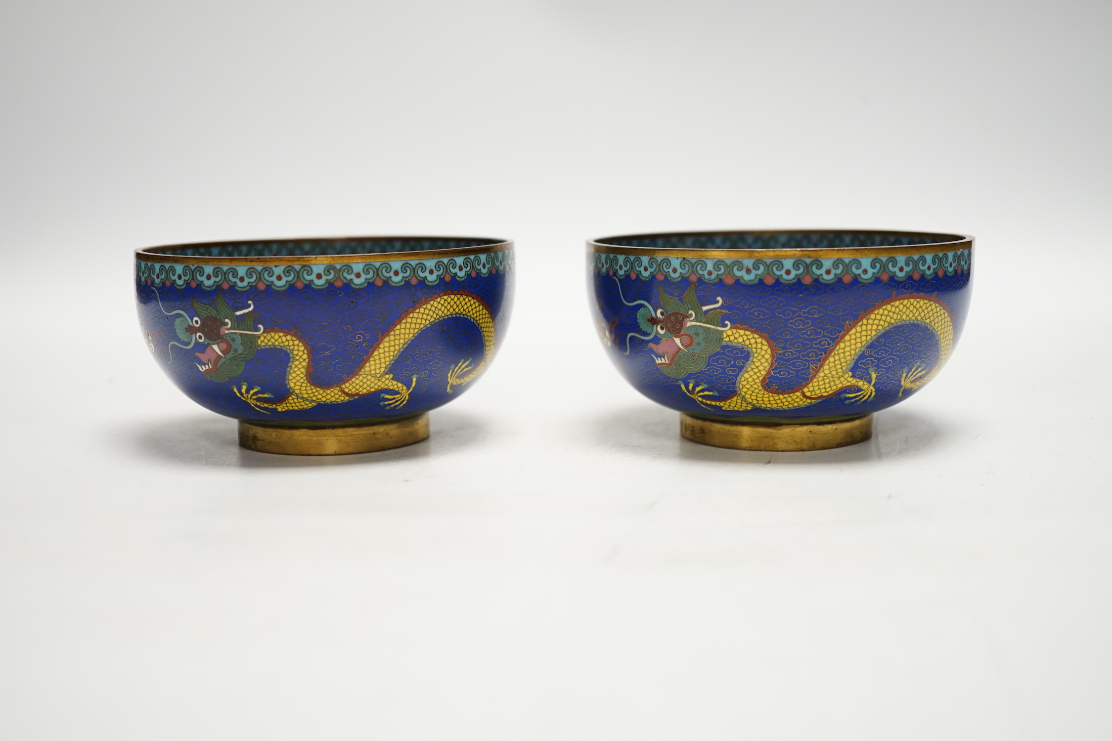 A pair of Chinese cloisonné enamel bowls decorated with dragons, c.1890-1910, signed lao tian li zhi, 11cm in diameter